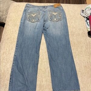 Vintage Mark Ecko 36 32 distressed Standard fit Embroidered Blue Jeans boot cut?